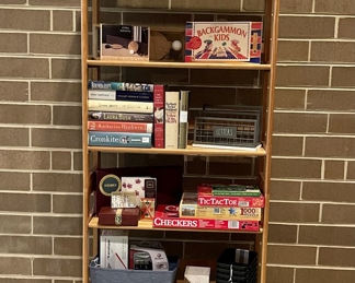 Double decker bookcase - can be one tall, or two small.  Books, baskets, games, frames, and office supplies - large inventory of all!