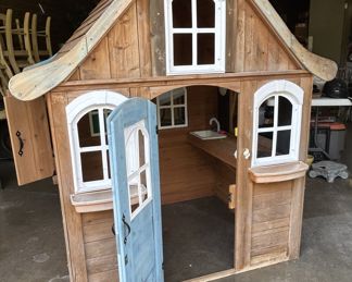 The Perfect Playhouse with a little TLC - fun father-daughter DIY project.  Let your little one do some interior decorating.  Maybe some flowers for the window boxes?  A wreath on the door?