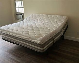 Beauty Rest Mattress, King size, only slept on a few times, always with topper, excellent condition, head and foot raise independently, with remotes
