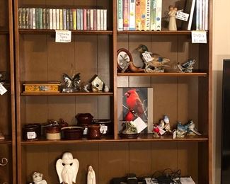 Angels
Magnavox Blueray/VHS player
Bird figurines
Cassette tapes, DVDs, VHS tapes