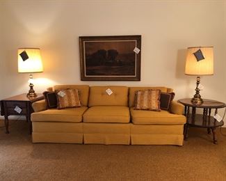 Custom made sofa (96” W)
Sprague and Carleton solid wood drop leaf end table (20” W x 25” D, drop leaves add 18” to width)
Round wooden end table - 26" round
Sofa painting