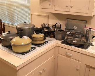 Vintage hammered Club Aluminum Dutch oven
Vintage hammered Club Aluminum pot w/lid
Large pot
Club Aluminum sauce pan
Club Aluminum frying pan
Two Pampered Chef plastic steamers
Metal strainer
Tea kettle
Four sauce pots
Non-stick 8” frying pan
Coffee pot w/filters
Vintage frying pan
