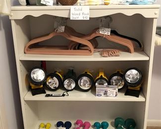 Solid wood white 3-shelf bookshelf (33” W x 40.5” H x 12” D)
Hand weights
Flashlights
Velvet slimline clothes hangers
