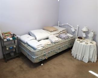 White metal twin headboard w/ frame, mattresses
Twin bedding
Metal storage shelf (16” W x 27.5” H x 19” D)
24” round table w/ skirt (22” H)
Lamp
Porcelain angel
Stained glass angel night lights