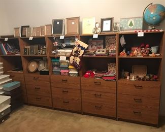 3-drawer bookcases (qty 5) (30” W x 72” H x 12” D)
Holiday decor, gift bags, bows
Lots of frames
World globe