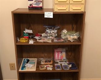 3-shelf bookcase (28” W x 43.5” H x 11.5” D)
Sewing material including vintage notions, sewing machine oil, buttons
Vacuum sealed storage bags
