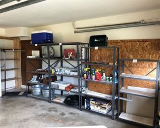 Clothes rack 
Four storage shelves
Cooler (latch broken)
Behrens tubs
Tools
Lots of incandescent lightbulbs - three-way, various wattages 
Garden chemicals 
Garden hose
4 1/4 square porcelain tile (90 pieces)
Garden hand tools
42”
Ceiling fan NIB
Roller shade
Porcelain single bulb ceiling fixtures 