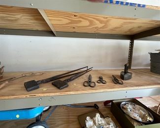 Antique waffle irons,  scissors and iron