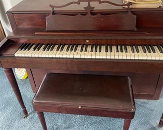 Vintage Wurlitzer piano with matching bench