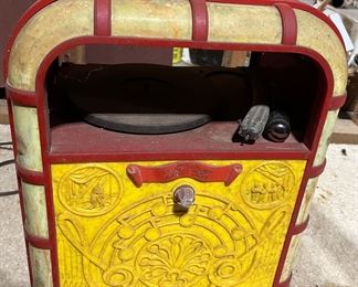Extremely rare 1948 Bing Crosby Junior Jukebox.  With a little elbow grease, this would be a great conversation piece --- it might still work!  Everything in the house is in great condition.