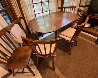 Ethan Allen Kitchen Table with 7 chairs.  We did not locate another chair -- It's quite possible there wasn't another one.  Everything is in pristine condition in this home.