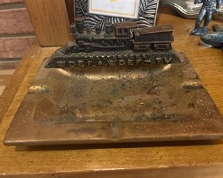 Several vintage ashtrays -- This Brass Chattanooga WDEF promotional item is from the 1950s.  