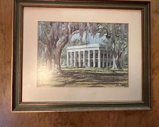 Various prints of New Orleans landscape are located throughout this home.  