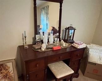 The vanity is complete with matching stool.  No broken pieces that we could find visible to the eye.