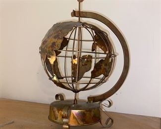 Musical rotating metal copper globe