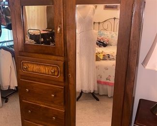 Antique double door and drawer armoire. Has matching chest of drawers 