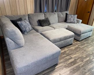This sectional sofa is like new and available to view by request. Not in main house