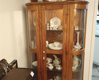 Curio with elegant glassware, ...