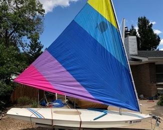 Sunfish sailboat and trailer.
