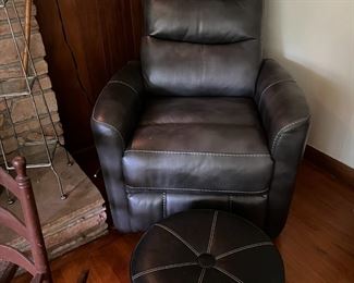 Swivel rocker/recliner with rolling footstool. 