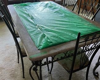 Gorgeous faux marble, metal and glass dining room table with 6 regular chairs and 3 matching barstools.