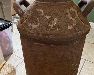 Rusted old milk jug.