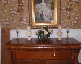 Several portraits and lovely antique furniture