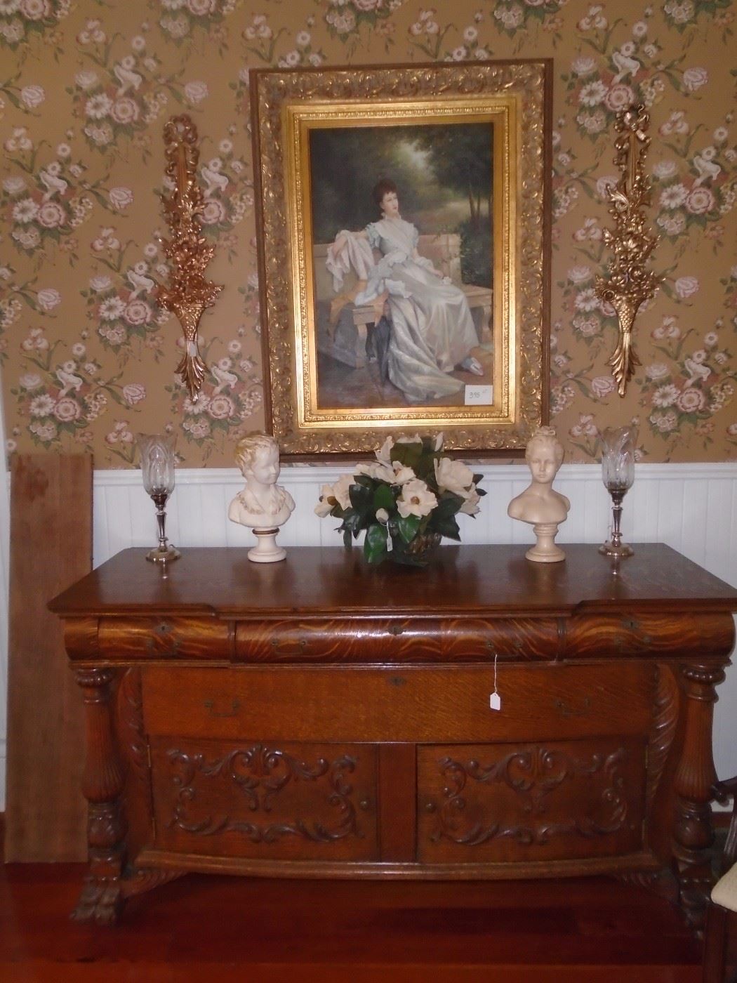 Several portraits and lovely antique furniture