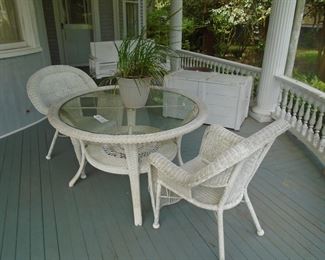 Older wicker, primitive chest, oversized porch swing