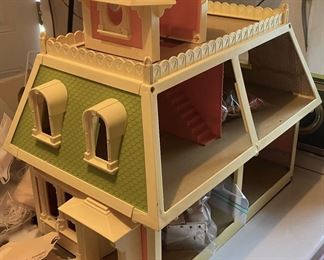 The Littles' vintage dollhouse with dolls and furniture. A real collectible that's still fun for all!