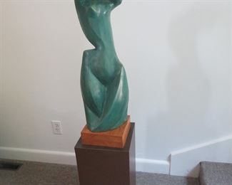 Contemporary carved plaster torso (28"h)  on pedestal 