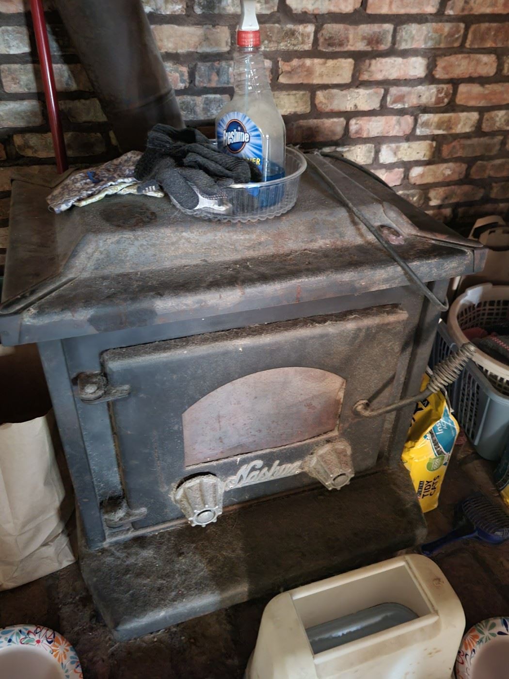 Nashua cast iron wood burner This item will need to be removed from existing home. Please bring help and tools to remove item. Must schedule an appointment for pickup. $1000 OBO