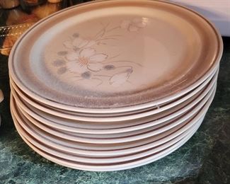 set of 8 flower plates $10
