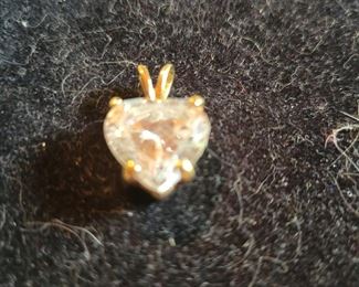 Gold and crystal like charm $15