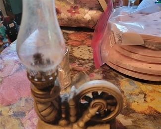 Vintage spinning wheel oil lamp $12