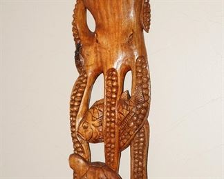 Wood carved octopus with fish and turtle
