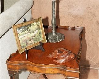 Antique side table with slag glass lamp with brass base.
