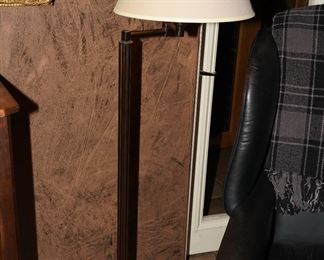 Adjustable arm cylindrical floor lamp