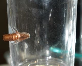 Bullet rocks glass