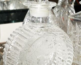 There are several vintage & antique crystal decanters for sale. 