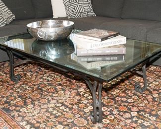 Glass topped cast iron coffee table