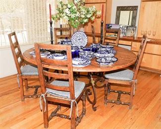 Vintage hardwood table on wrought iron base