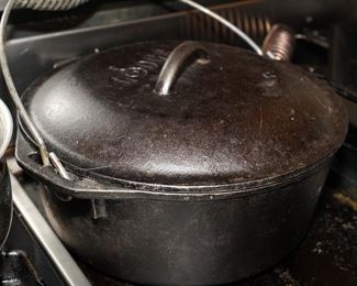 Lodge cast iron covered stock pot