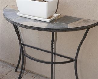 Tile topped wrought iron demi-lune table