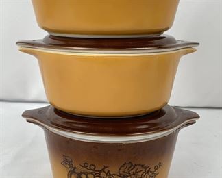 Set of Three Pyrex Dishes With Lids