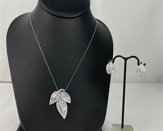 Sterling Silver Set Of Earrings And Pendant On A Chain