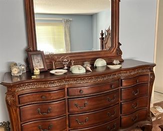 Dresser and mirror match the king size bed  $377
