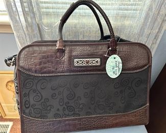 Never used. Brighton carrying case, $75.00
