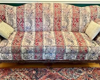 UPHOLSTERED ANTIQUE CLAW FOOT SOFA