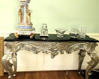Silver carved entry table with marble look top